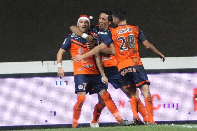Fußball, Frankreich, Ligue 1, Anthony Mounier von Montpellier jubelt nach Tor mit Weihnachtsmütze