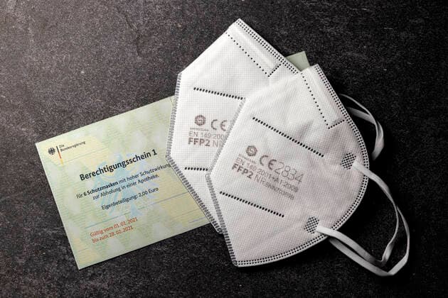 Coronavirus, fälschungssicherer Berechtigungsschein der Bundesdruckerei für FFP2-Masken, Symbolfotos