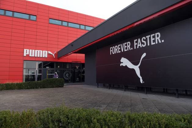 Sportartikelhersteller Puma mit deutlichem Umsatzrückgang und Verlust, Symbol- und Archivbilder
