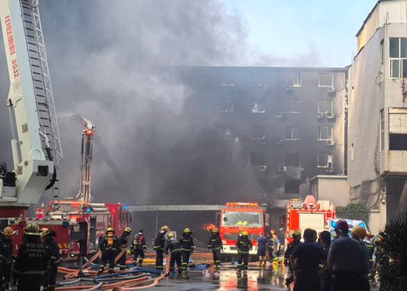 China, Brand in Schuhfabrik in Jinjiang
