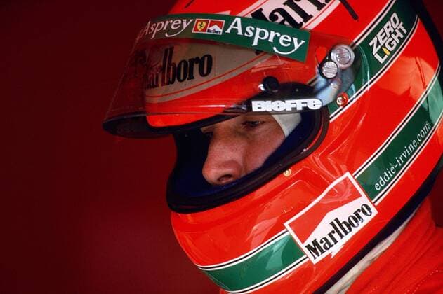 Der Nordire Eddie Irvine (Ferrari) Motorsport Grand Prix Herren Weltmeisterschaft 1998, WM, Großer Preis von Italien, F 1, Formel 1, F1, Automobilrennsport Porträt Autodromo Nazionale Monza Konzentration,