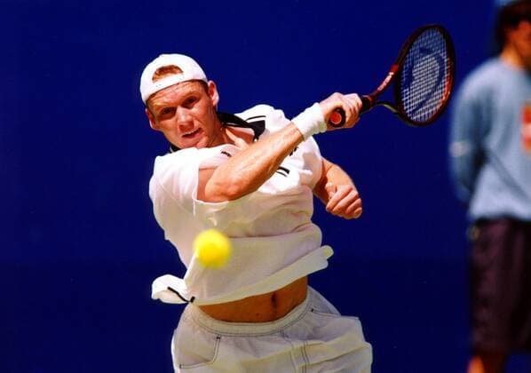 Rainer Schüttler (Deutschland) holt zum Return aus Tennis Herren Australian Open 1999, Grand Slam, ATP Tour, Hartplatz, Hardcourt Einzelbild Flinders Park Melbourne Dynamik, Konzentration,