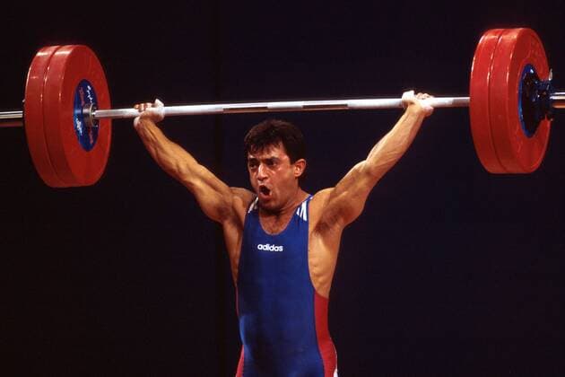 Ivan Ivanov (Bulgarien) - Reißen Gewichtheben OS Sommer Herren Olympische Sommerspiele 2000, Olympia, Olympiade, Spiele, Klasse bis 56kg, 56 kg, Kilogramm Einzelbild Convention and Exhibition Centre Sydney Anstrengung,