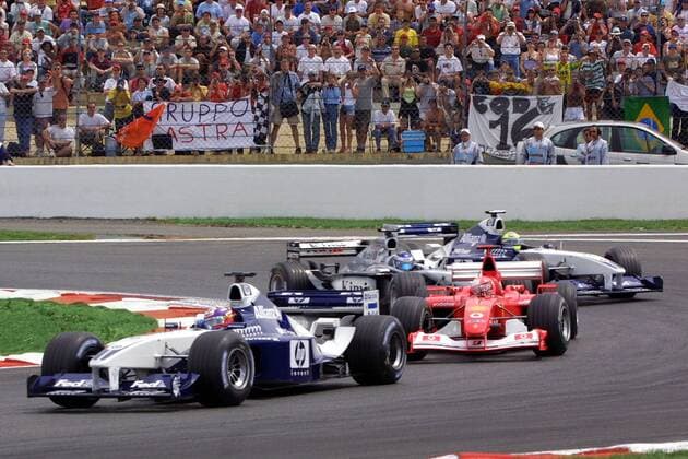 Juan Pablo Montoya (Kolumbien BMW-Williams), verfolgt von Michael Schumacher (Deutschland Ferrari), Kimi Räikkönen (Finnland McLaren-Mercedes) und Ralf Schumacher (Deutschland BMW-Williams) Motorsport Grand Prix Herren Großer Preis von Frankreich 2002, Formel 1 Weltmeisterschaft, F1, F, GP, WM, Vdig Gruppe Circuit de Nevers Magny-Cours