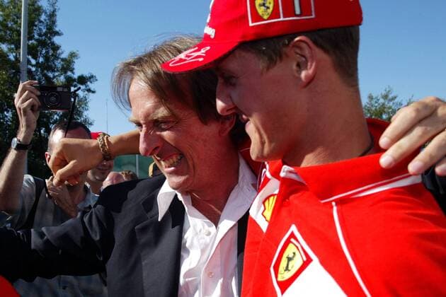 Präsident Luca di Montezemolo (Italien) und der frischgebackene Weltmeister Michael Schumacher (Deutschland beide Ferrari) bejubeln den Titelgewinn Motorsport Grand Prix Herren Großer Preis von Frankreich 2002, Formel 1 Weltmeisterschaft, F1, F, GP, WM, Vdig Gruppe Circuit de Nevers Magny-Cours Glück Freude, Begeisterung