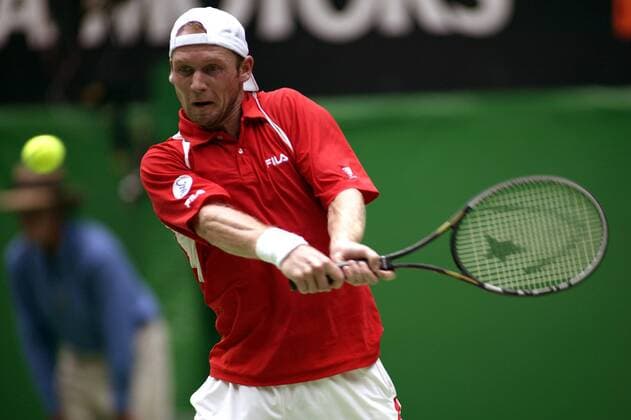 Rainer Schüttler (Deutschland) - beidhändige Rückhand Tennis Herren Australian Open 2003, ATP-Tour, Grand Slam, Hartplatz, Hardcourt, Hartplatztennis, Hartplatzturnier Einzelbild Flinderspark Melbourne Dynamik,
