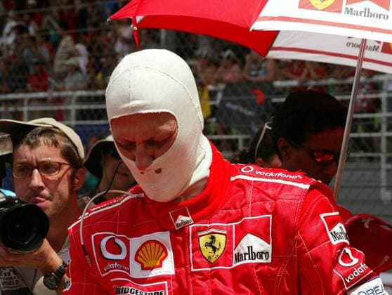 Michael Schumacher (Deutschland Ferrari) mit Feuermaske Motorsport Grand Prix Herren Großer Preis von Malaysia 2003, Formel 1 Weltmeisterschaft, F1, F, GP, WM, Vdig Einzelbild Sepang