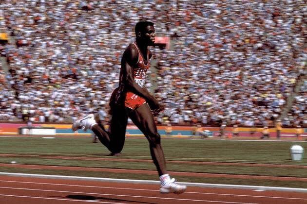 Carl Lewis (USA) Leichtathletik OS Sommer Herren Olympische Spiele 1984, Sommerspiele, Olympia, Olympiade, Nationaltrikot, Einzelbild Los Angeles Dynamik,