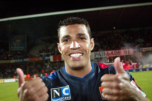 Sonny Anderson (Lyon) feiert die Titelverteidigung Fußball Herren Ligue Une 2002 2003, 1. Französische Liga, Montpellier - Olympique Lyonnais 1:1, OL, Vdig Porträt Montpellier Freude,  