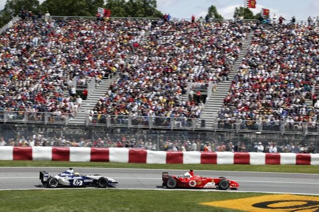 Michael Schumacher (Ferrari), verfolgt von Ralf Schumacher (beide Deutschland BMW-Williams) Motorsport Grand Prix Herren Großer Preis von Kanada 2003, Formel 1 Weltmeisterschaft, F1, F, GP, WM, Vdig Totale Montreal