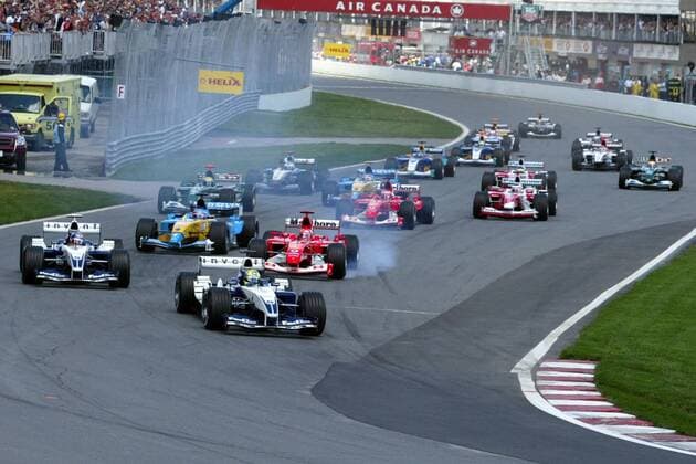 GP Kanada 2003: Ralf Schumacher (Deutschland) führt das Fahrerfeld vor Juan Pablo Montoya (li., Kolumbien beide BMW-Williams) und Michael Schumacher (Deutschland Ferrari) nach dem Start an Motorsport Grand Prix Herren Großer Preis von Kanada 2003, Formel 1 Weltmeisterschaft, F1, F, GP, WM, Vdig Totale Montreal Dynamik,