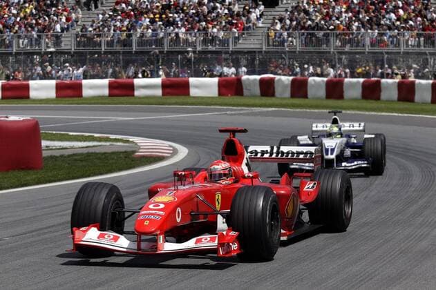 Michael Schumacher (Ferrari) vor seinem Bruder Ralf (beide Deutschland BMW-Williams) Motorsport Grand Prix Herren Großer Preis von Kanada 2003, Formel 1 Weltmeisterschaft, F1, F, GP, WM, Vdig Gruppe Montreal
