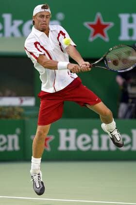 Lleyton Hewitt (Australien) - beidhändige Rückhand Tennis Herren Australian Open 2004, Grand Slam, ATP-Tour, Hartplatz, Hardcourt, Hartplatztennis, Hartplatzturnier Einzelbild Melbourne Dynamik,