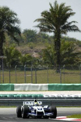 Ralf Schumacher (Deutschland BMW-Williams) in seinem Boliden unter Palmen Motorsport Grand Prix Herren Großer Preis von Malaysia 2004, Formel 1 Weltmeisterschaft, F1, F, GP, WM, Vdig Totale Sepang Kuala Lumpur