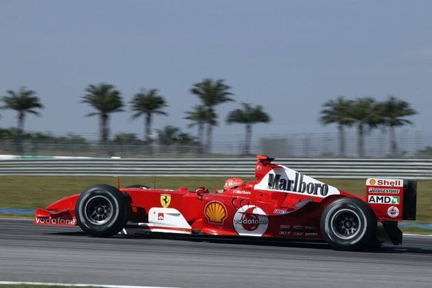 Michael Schumacher (Deutschland Ferrari) in seinem Boliden Motorsport Grand Prix Herren Großer Preis von Malaysia 2004, Formel 1 Weltmeisterschaft, F1, F, GP, WM Einzelbild Sepang Kuala Lumpur Dynamik,