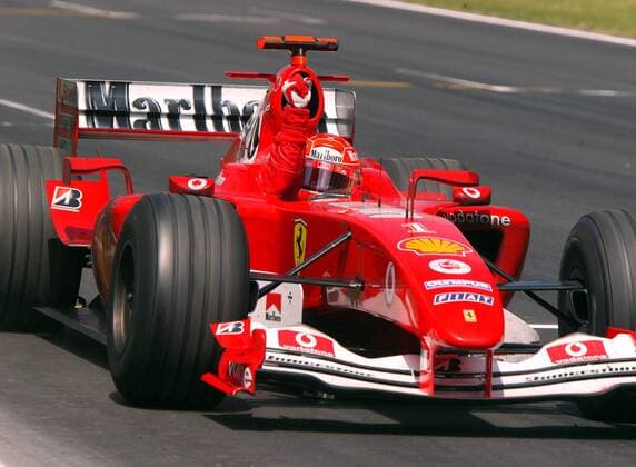 Michael Schumacher (Deutschland Ferrari) jubelnd Motorsport Grand Prix Herren Großer Preis von Spanien 2004, Formel 1 Weltmeisterschaft, F1, F, GP, WM, Vdig Einzelbild Circuit de Catalunya Barcelona Freude,