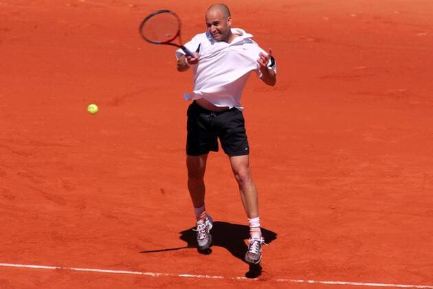 Andre Agassi (USA) - Vorhand Tennis Herren French Open 2004, Grand Slam, ATP-Tour, Sand, Sandplatz, Sandplatztennis, Sandplatzturnier Einzelbild Roland Garros Paris Dynamik,  