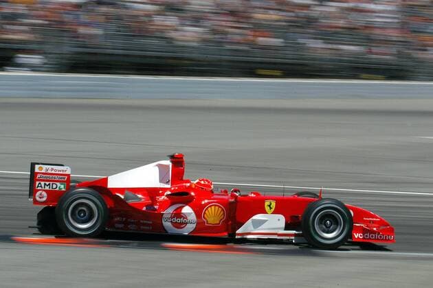 Michael Schumacher (Deutschland Ferrari) in seinem Boliden Motorsport Grand Prix Herren Großer Preis der USA 2004, Formel 1 Weltmeisterschaft, F1, F, GP, WM Einzelbild Indianapolis Speedway Indianapolis Dynamik,