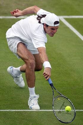 Thomas Haas (Deutschland) - Rückhandslice Tennis Herren All England Championships 2004, Grand Slam, ATP-Tour, Rasen, Rasenplatz, Rasentennis, Rasenturnier, Einzelbild Wimbledon London Dynamik