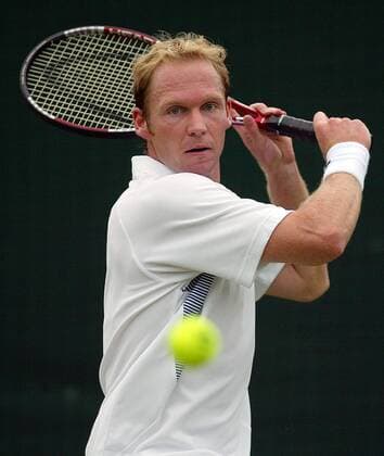Rainer Schüttler (Deutschland) - Rückhandslice Tennis Herren All England Championships 2004, Grand Slam, ATP-Tour, Einzelbild Wimbledon London