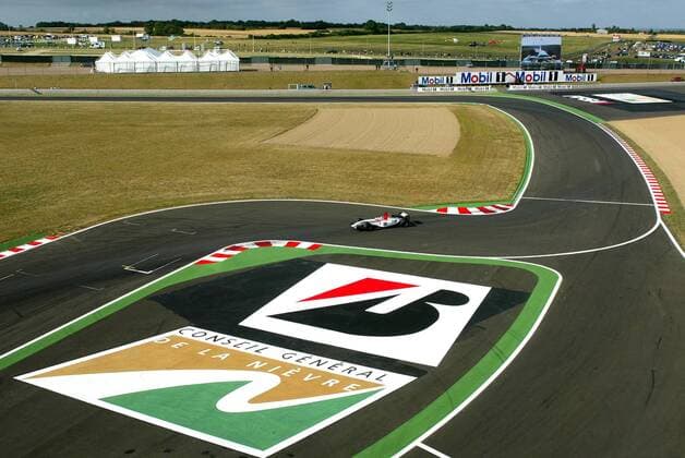 Takuma Sato (Japan BAR Honda) in der Kurve Motorsport Grand Prix Herren Großer Preis von Frankreich 2004, Formel 1 Weltmeisterschaft, F1, F, GP, WM, Freies Training Totale Circuit de Nevers Magny-Cours