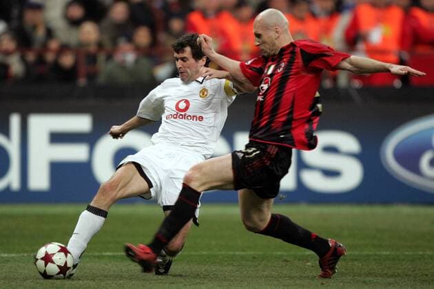 Roy Keane (li., Manchester United) gegen Jaap Stam (Milan) Fußball EC 1 Herren Champions League 2004 2005, Achtelfinale, AC Mailand - Manchester United 1:0, ManU, Gruppe pan8463 Mailand Dynamik,  