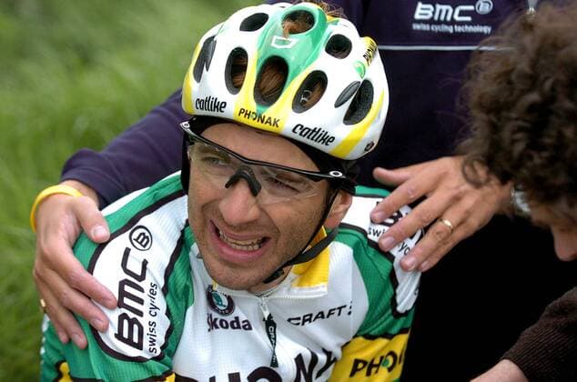 Fabrizio Guidi (Italien Phonak) mit Schmerzen nach seinem Sturz -  Radsport Herren Gent - Wevelgem 2005, ProTour, Straßenradsport, Straße, Rad, Vdig Porträt Graben