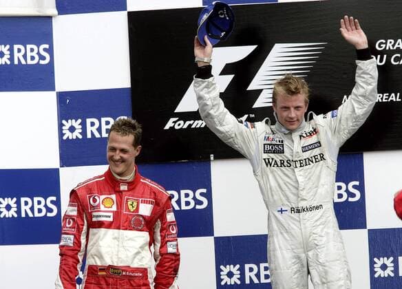 Sieger Kimi Räikkönen (Finnland McLaren Mercedes) feiert neben dem Zweitplazierten Michael Schumacher (Deutschland Ferrari) seinen Erfolg beim Großen Preis von Kanada 2005 Motorsport Grand Prix Herren Großer Preis von Kanada 2005, Formel 1 Weltmeisterschaft, F1, F, GP, WM, Vdig, Gruppe Montreal Freude,