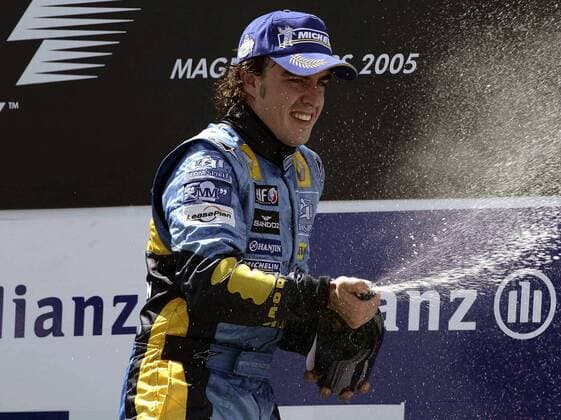 Fernando Alonso (Spanien Renault) - Champagnerdusche Motorsport Grand Prix Herren Großer Preis von Frankreich 2005, Formel 1 Weltmeisterschaft, F1, F, GP, WM, Vdig Einzelbild Circuit de Nevers Magny Cours Freude, Begeisterung,