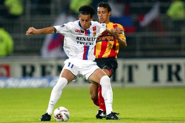 Fred (Lyon, vorn) gegen Vitorino Hilton (Lens) Fußball Herren Ligue Une 2005 2006, 1. Französische Liga, Olympique Lyonnais - RC Lens 1:1, OL Gruppe pan10883 Lyon o0 Racing Club Dynamik,  