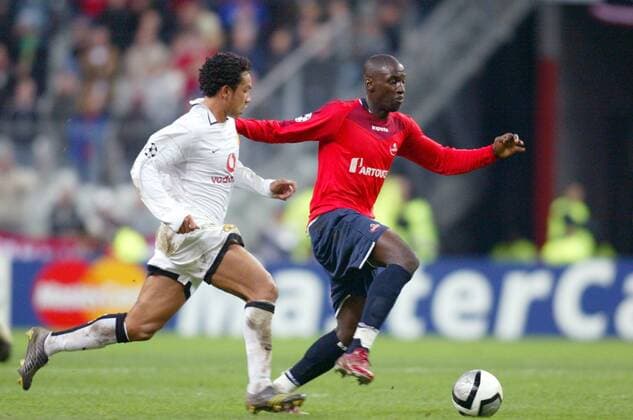 Matt Moussilou (Lille, re.) gegen Kieran Richardson (Manchester United) Fußball EC 1 Herren Champions League 2005 2006, OSC Lille - Manchester United 1:0, ManU Gruppe pan11338 Paris Dynamik,  