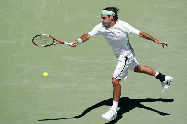 Roger Federer (Schweiz) - Vorhand Tennis Herren Australian Open 2006, Grand Slam, ATP Tour, Hartplatz, Hardcourt, Hartplatztennis, Hartplatzturnier Einzelbild Melbourne Dynamik,