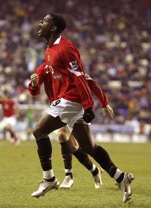 Louis Saha (Manchester United) - Torjubel - EDITORIAL USE ONLY. No use with unauthorised audio, video, data, fixture lists, club league logos or live services. Online in-match use limited to 120 images, no video emulation. No use in betting, games or single club league player publications. Fußball Herren English Premier League 2005 2006, 1. Englische Liga, Manchester United, ManU Einzelbild Wigan Freude, Begeisterung,