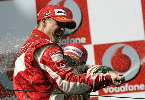 Siegerehrung GP von Europa 2006 - Sieger Michael Schumacher (Deutschland Ferrari) mit einer Sektdusche Motorsport Grand Prix Herren Großer Preis von Europa 2006, Formel 1 Weltmeisterschaft, F1, F, GP, WM, Einzelbild Nürburgring Nürburg Begeisterung, Freude,