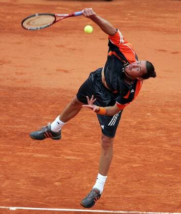 Marat Safin (Rußland) - Aufschlag Tennis Herren French Open 2006, ATP Tour, Grand Slam, Sand, Sandplatz, Sandplatztennis, Sandplatzturnier Einzelbild Roland Garros Paris Dynamik,