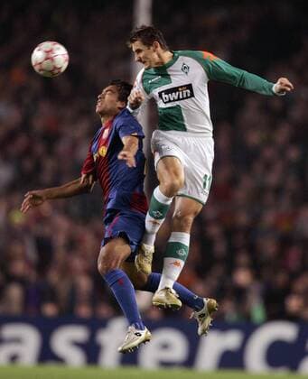 Miroslav Klose (Bremen, re.) gegen Giovanni van Bronckhorst (FC Barcelona) Fußball EC 1 Herren Champions League 2006 2007, FC Barcelona - SV Werder Bremen 2:0, Barca Gruppe Barcelona Fußball EC 1 Herren Champions League 2006 2007, FC Barcelona - SV Werder Bremen 2:0, Barca Gruppe Barcelona