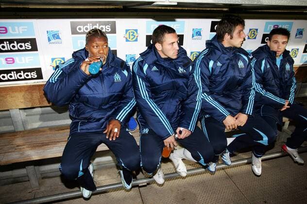 Ersatzbank Marseille, v.li.: Djibril Cisse, Thomas Deruda, Bostjan Cesar und Mathieu Valbuena -  (pan17751) Fußball Herren Ligue 1 2006 2007, 1. Französische Liga, Olympique de Marseille, OM Gruppe Marseille Fußball Herren Ligue 1 2006 2007, 1. Französische Liga, Olympique de Marseille, OM Gruppe Marseille  