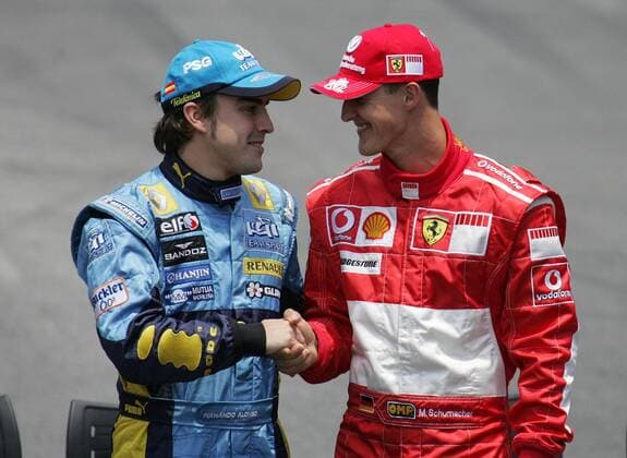 Fairplay der ärgsten Konkurrenten im F1 Sport 2006 - Michael Schumacher (Deutschland Ferrari, re.) und Fernando Alonso (Spanien Renault) reichen sich die Hand Motorsport Grand Prix Herren Großer Preis von Brasilien 2006, Formel 1 Weltmeisterschaft, F1, F, GP, WM Gruppe Interlagos Sao Paulo Harmonie Motorsport Grand Prix Herren Großer Preis von Brasilien 2006, Formel 1 Weltmeisterschaft, F1, F, GP, WM Gruppe Interlagos Sao Paulo Harmonie
