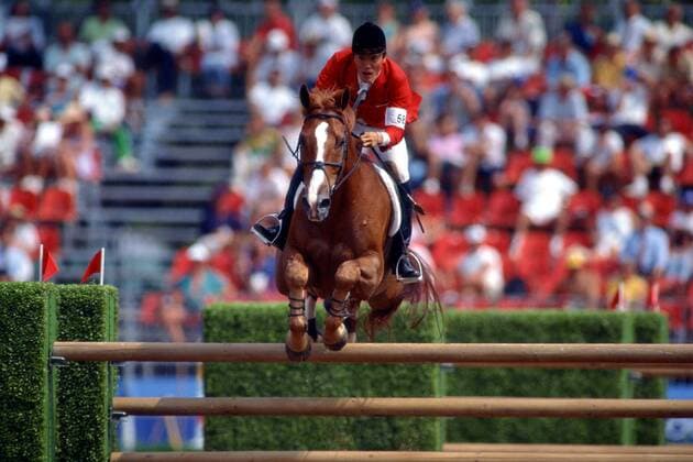 Hirosuke Tomizawa (Japan) auf Don Carlos -  (aflo0008) Pferdesport OS Sommer Herren Olympische Spiele Barcelona 1992, Sommerspiele, Reiten, Reitsport, Springreiten, Springen Einzelbild Barcelona Pferdesport OS Sommer Herren Olympische Spiele Barcelona 1992, Sommerspiele, Reiten, Reitsport, Springreiten, Springen Einzelbild Barcelona