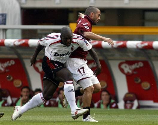 Clarence Seedorf (AC Mailand, li.) gegen Nikola Lazetic (FC Turin) -  Fußball Herren Serie A 2006 2007, 1. Italienische Liga, FC Turin - Milan 0:1 Gruppe Turin Dynamik, Fußball Herren Serie A 2006 2007, 1. Italienische Liga, FC Turin - Milan 0:1 Gruppe Turin Dynamik,