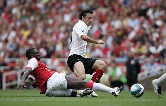 Kolo Toure (Arsenal, li.) gegen Simon Davies (Fulham) -  Fußball Herren English Premier League 2007 2008, 1. Englische Liga, Arsenal FC London - Fulham FC 2:1 Gruppe London Dynamik, Kampf, Fußball Herren English Premier League 2007 2008, 1. Englische Liga, Arsenal FC London - Fulham FC 2:1 Gruppe London Dynamik, Kampf,