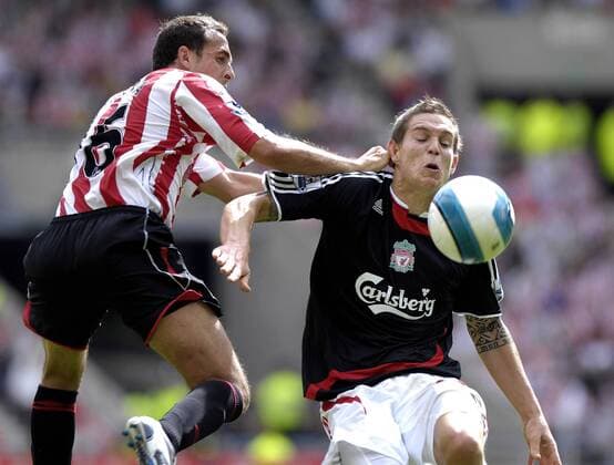 Daniel Agger (Liverpool, re.) gegen Michael Chopra (Sunderland) - EDITORIAL USE ONLY. No use with unauthorised audio, video, data, fixture lists, club league logos or live services. Online in-match use limited to 120 images, no video emulation. No use in betting, games or single club league player publications. Fußball Herren English Premier League 2007 2008, 1. Englische Liga, Sunderland AFC - FC Liverpool 0:2, FC, Vdig Gruppe Sunderland Dynamik, Kampf, Fußball Herren English Premier League 2007 2008, 1. Englische Liga, Sunderland AFC - FC Liverpool 0:2, FC, Vdig Gruppe Sunderland Dynamik, Kampf,