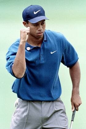 Eldrick Tiger Woods (USA) jubelt-  (AUG97041101) Golf Herren Masters Tournament 1997, PGA Tour, Einzelbild Augusta Golf Herren Masters Tournament 1997, PGA Tour, Einzelbild Augusta