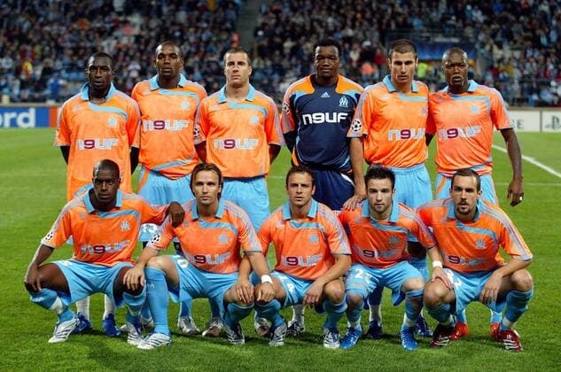 Mannschaftsbild Marseille, hi.v.li.: Mamadou Niang, Ronald Zubar, Benoit Cheyrou, Torwart Steve Mandanda, Lorik Cana, Djibril Cisse; vorn: Jacques Faty, Boudewijn Zenden, Laurent Bonnart, Matthieu Valbuena und ... - (pan22892) Fußball EC 1 Herren Champions League 2007 2008, Olympique de Marseille, OM Totale Marseille Fußball EC 1 Herren Champions League 2007 2008, Olympique de Marseille, OM Totale Marseille
