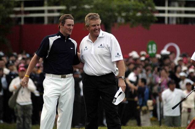 Marc Warren (li.) und Colin Montgomerie (beide Schottland) zufrieden -  (IMC2007112509043) Golf WM Herren Mission Hills World Cup 2007, PGA Tour Gruppe Shenzhen Golf WM Herren Mission Hills World Cup 2007, PGA Tour Gruppe Shenzhen