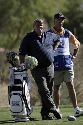 John Daly (USA, li.) mit seinem Caddie und Schlägertasche - (Icon36961697) Golf Herren Bob Hope Chrysler Classic 2008, PGA Tour Gruppe Palm Springs Golf Herren Bob Hope Chrysler Classic 2008, PGA Tour Gruppe Palm Springs EDITORIAL USE ONLY