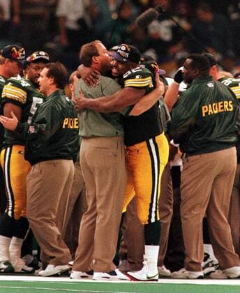 Trainer Mike Holmgren (li.) und Reggie White (beide Green Bay Packers, re.) -  (NOP97012613) American Football Herren NFL, o0 1996 1997, 31. Super Bowl XXXI, Finale Gruppe Harmonie, American Football Herren NFL, o0 1996 1997, 31. Super Bowl XXXI, Finale Gruppe Harmonie,