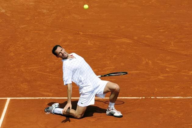 Michael Llodra (Frankreich) -  Tennis Herren French Open 2008, Grand Slam, ATP Tour Einzelbild Roland Garros Paris Dynamik,