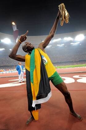 Olympia, Historie, Rückblick auf die Sommerspiele 2008 in Peking Usain Bolt (Jamaika) - Olympiasieger 2008 über 200m Leichtathletik OS Sommer Herren Olympische Spiele 2008, Sommerspiele, Nationaltrikot, 200m Einzelbild Peking Freude, Begeisterung, Überlegenheit
