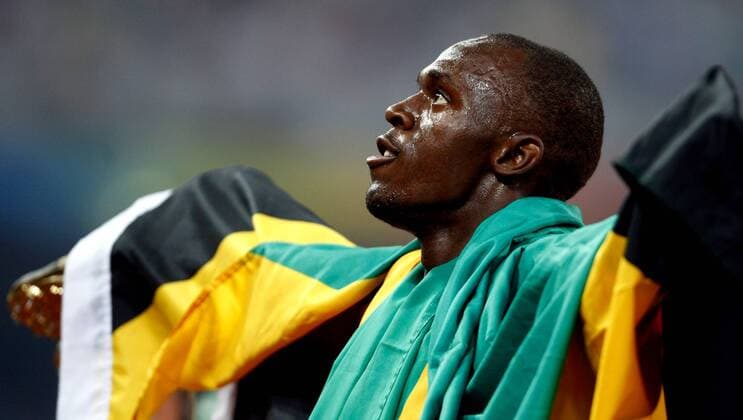 Usain Bolt (Jamaika), Olympiasieger 2008 über die 200m -  Leichtathletik OS Sommer Herren Olympische Spiele 2008, Sommerspiele, Nationaltrikot, 200m Einzelbild Peking Glück, Freude,